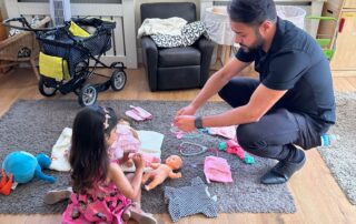dad and daughter doing imaginative play