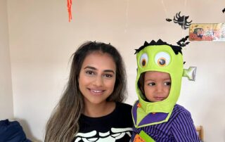 staff and child in halloween costumes