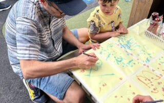 Family doing arts and crafts on Father's Day