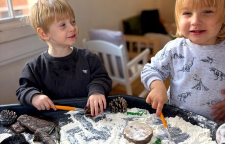 Toddlers enjoying tuff tray activity at Monkey Puzzle Uxbridge 74986f7a 76ff 4d46 8546 9669d36e7045 55230